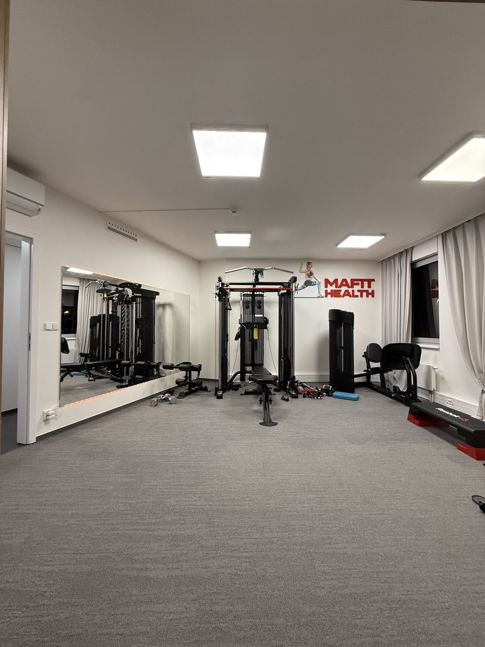 Mafit Prague — strength & performance studio with branded wall